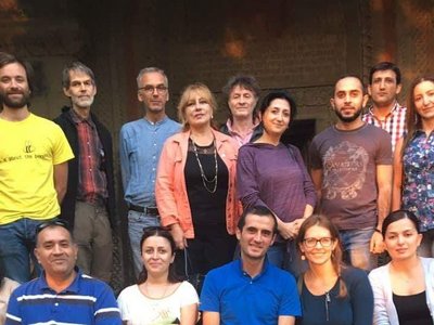 Group of people posing for a picture