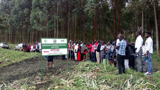 At the entrance of the Agroecological demonstration farm