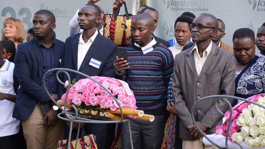 Group of people with serious faces standing and looking at something