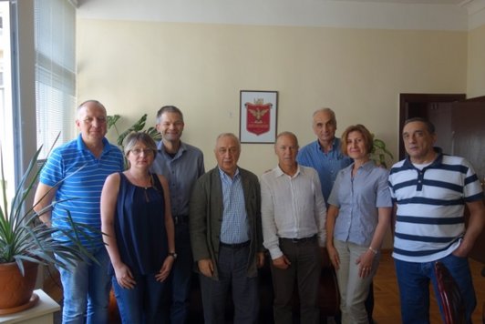 Group of people posing for a group picture