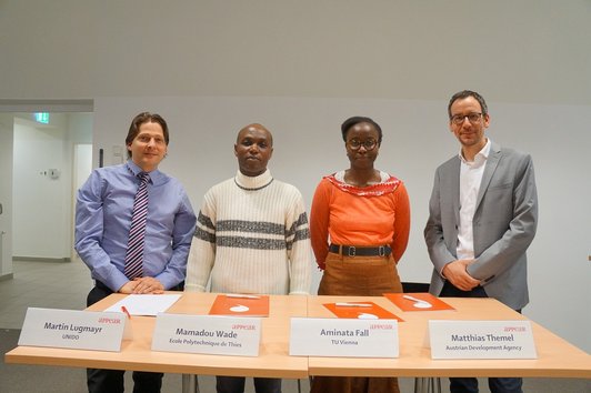 Picture of four speakers