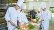  Cooking apprentices in the kitchen