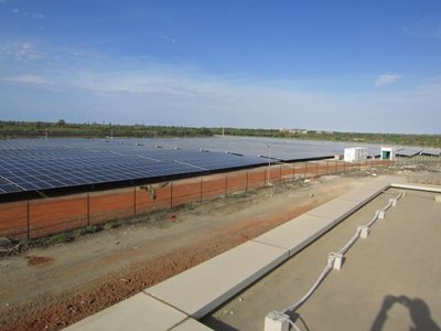 Big area with solar panels and a fence around it