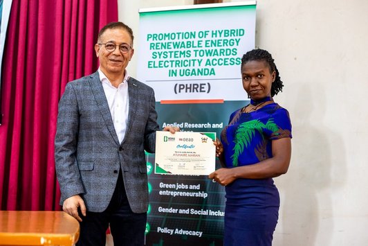award of certificate to female participant at to ToT