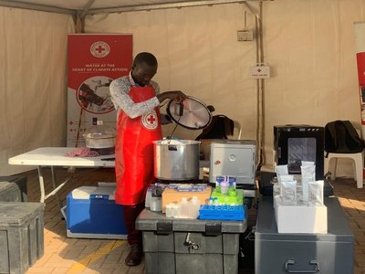 The Field Laboratory officer showcasing the lab apparatus during Uganda Water and Environment week celebration held at the Ministry of Water and Environment offices in Kampala.