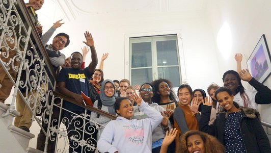 smiling group of scholarship holders posing for a group picture