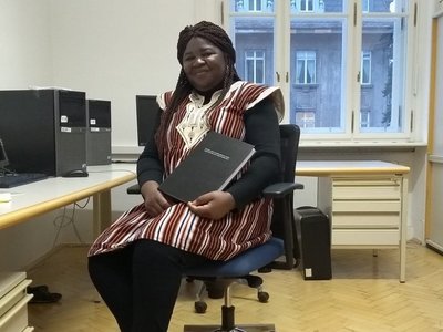 Bernadette Yougbaré in her office at BOKU with PhD thesis