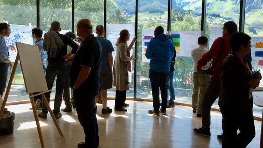 Participants of summer school discussing their findings 