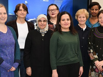 Group of people posing for a picture