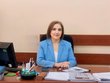 Photo of Liana Safaryan sitting at her desk