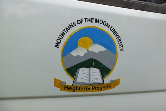 Illustration of the Mountains of the Moon University in Uganda with mountains, the sky, the sun, a book and lettering