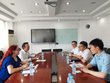  Representatives of the University of Salzburg and Fudan University sit at a meeting table and negotiate a university cooperation together with Alexandra Wagner from the OeAD Cooperation Office Shanghai.