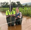 Students conducting stream discharge measurements using the newly acquired OTTHYDROMET current meter (Model 1600000721) during fieldwork in the Kigezi Highlands.