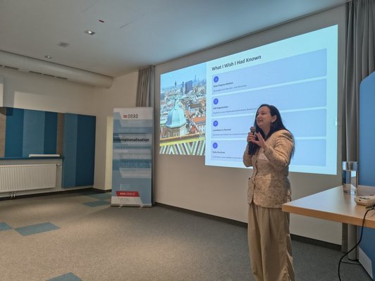 Photo of Sona Balasanyan giving a presentation