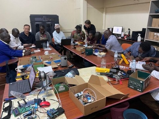Instructors are engaging with the trainees during the training session
