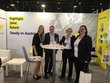 The Austrian stand at the fair with colleagues Sarah Widmoser, Michael Schedl and Eva Müllner from the OeAD and another lady.