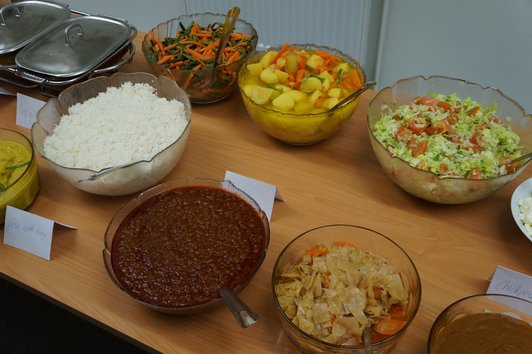 The picture is a close-up of a buffet table, probably vegetarian.