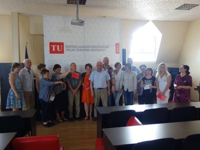 Group of people posing for a group picture