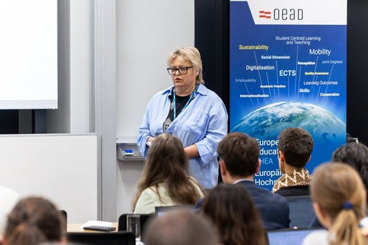 Maryna Mruga (Ministry of Education and Science of Ukraine) is presenting