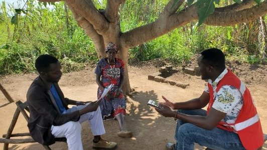 A man being interviewed.