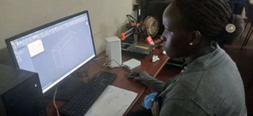 A female student modelling one of the mechanical components using Autodesk Inventor software