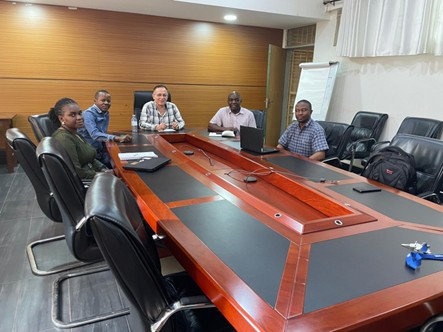 project team members meeting with PhD students
