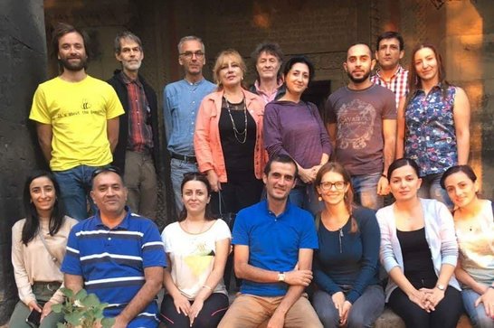 Group of people posing for a picture