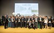  FIABCI Real Estate Award 2018 ceremony, group of people looking into the camera, some of them holding an award in the shape of a skyscraper, some others holding a certificate