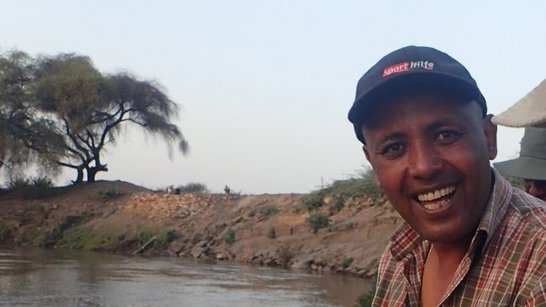 Dr. Aschalew at the middle-section of the Awash river helping fish scientist to gather data