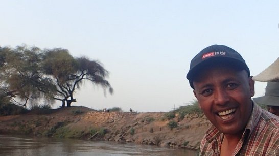 Dr. Aschalew at the middle-section of the Awash river helping fish scientist to gather data