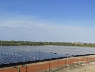 Big area with solar panels and a fence around it