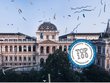 Foto des Hauptgebäudes der Universität Wien mit Konfetti und einem Badge mit der Aufschrift "Top 100"