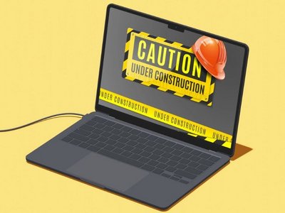 Laptop auf dessen Bildschirm "under construction" steht