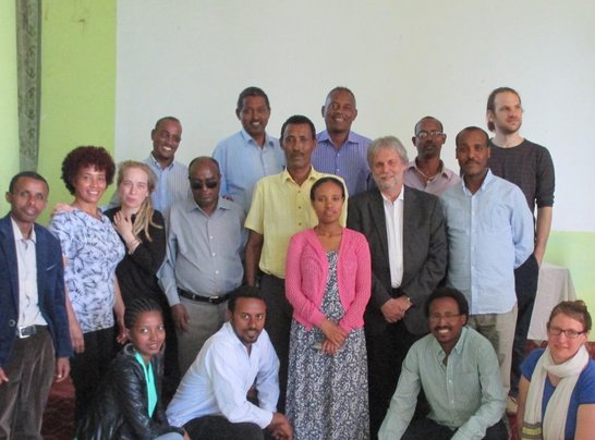 Gorup of people posing for a picture