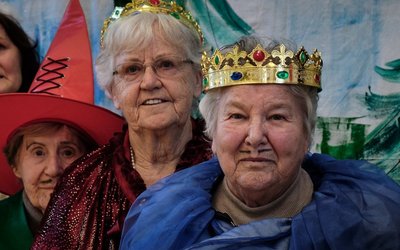  A group of older women in theater costumes