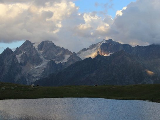 photo of mountain with lake