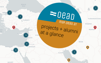 Darstellung der oead map. Eine Weltkarte mit einem Logo davor